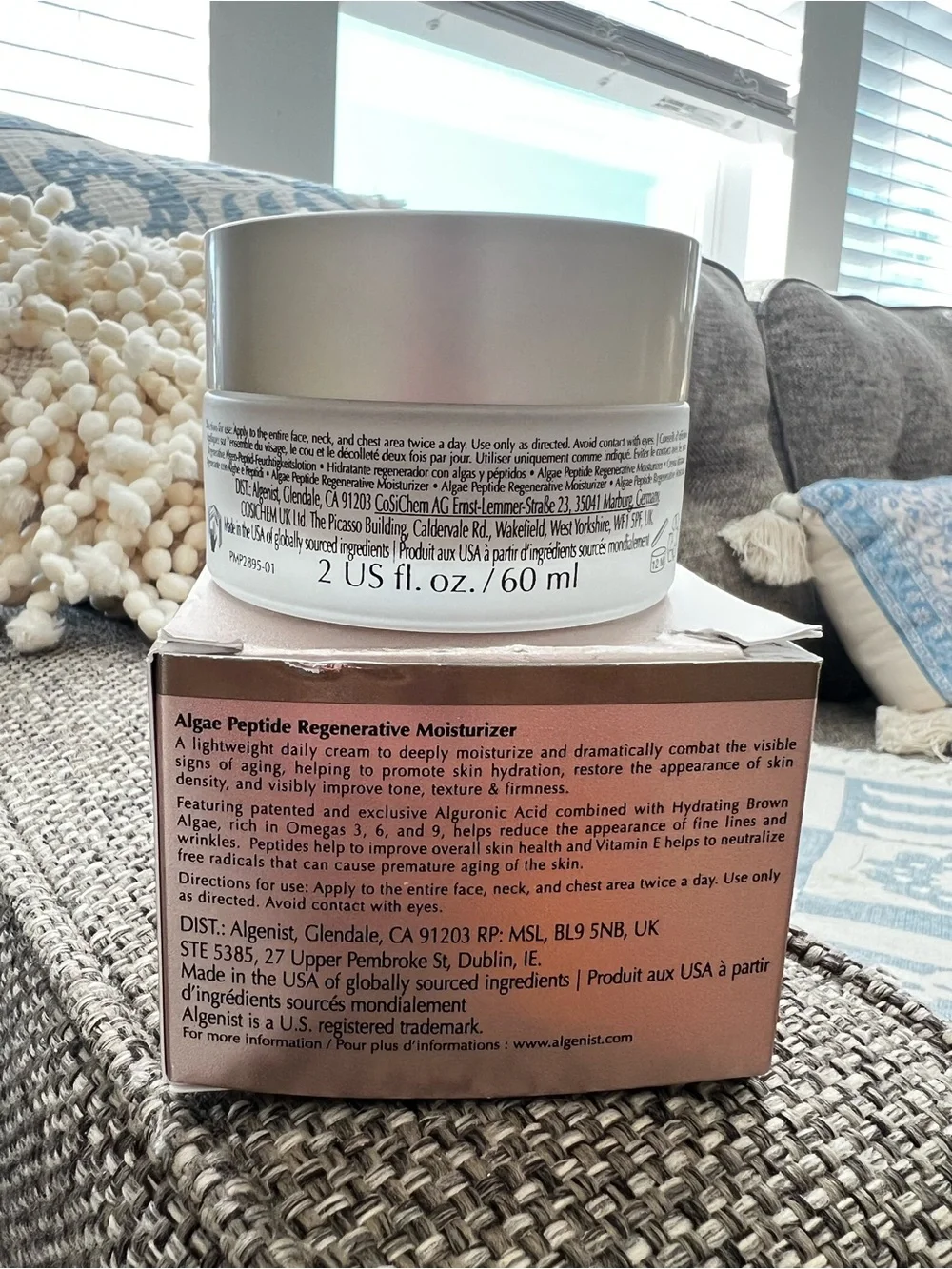 Algenist Moisturizer in Rose Gold and White